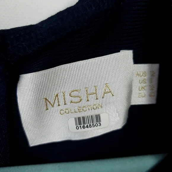 Misha collection cap sleeve ruffle bottom navy dress size 8